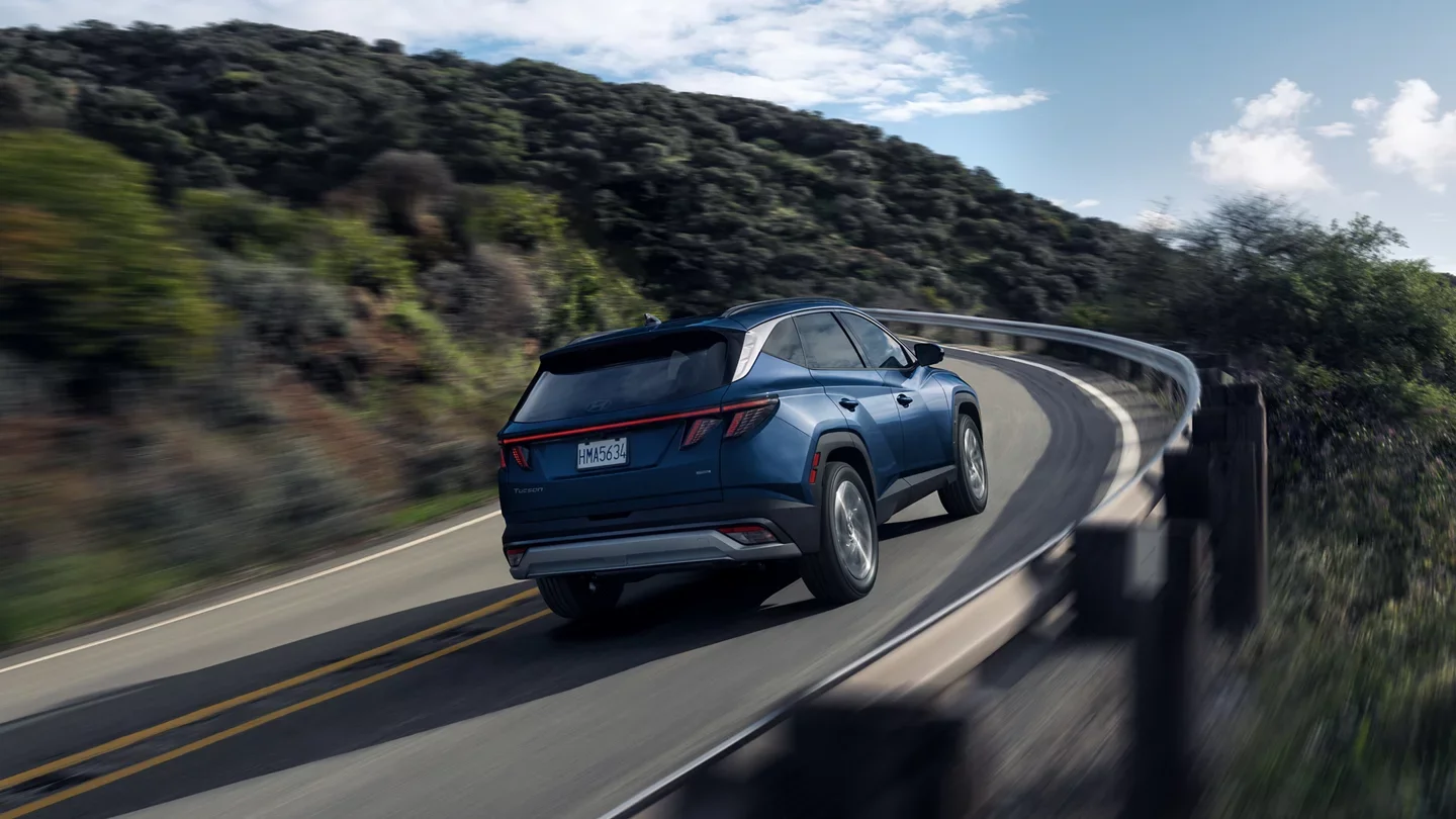 2025 Hyundai Tucson - Performance 2025 Hyundai Tucson driving on a mountain road