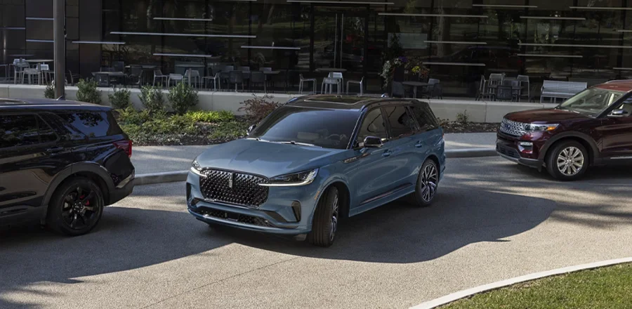 2025 Lincoln Aviator - Black Label Aviator Black Label parking in front of a building
