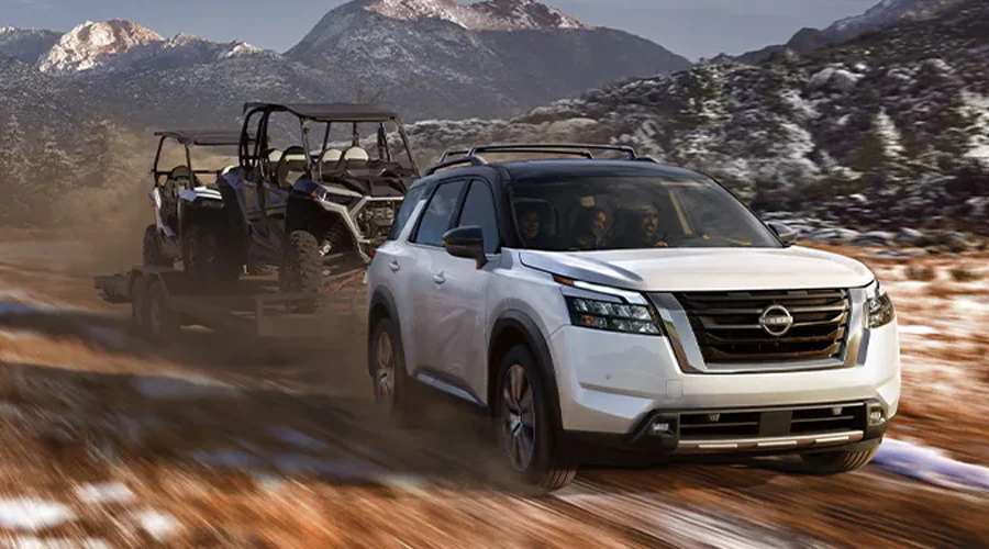 2025 Nissan Pathfinder towing a 4 wheeler