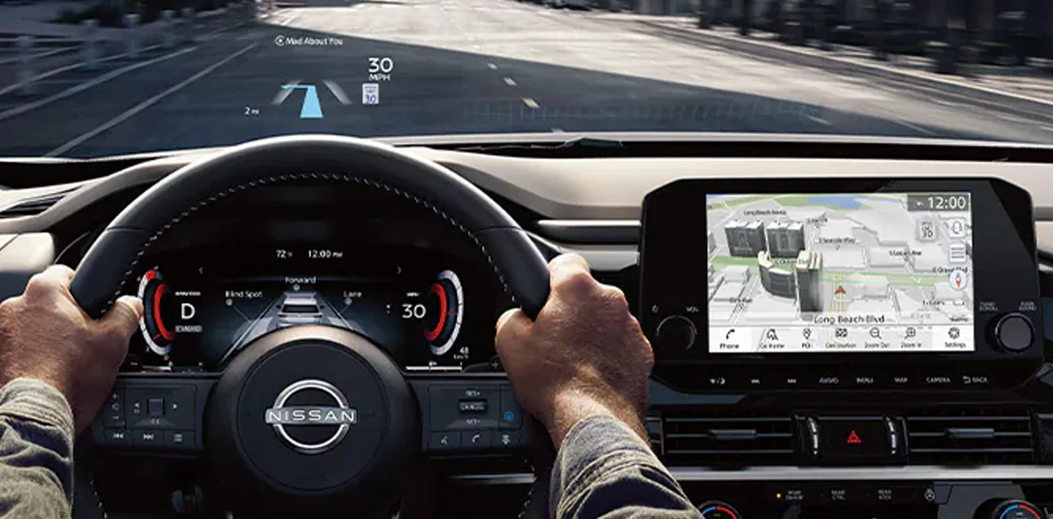 2025 Nissan Pathfinder with hands on the wheel