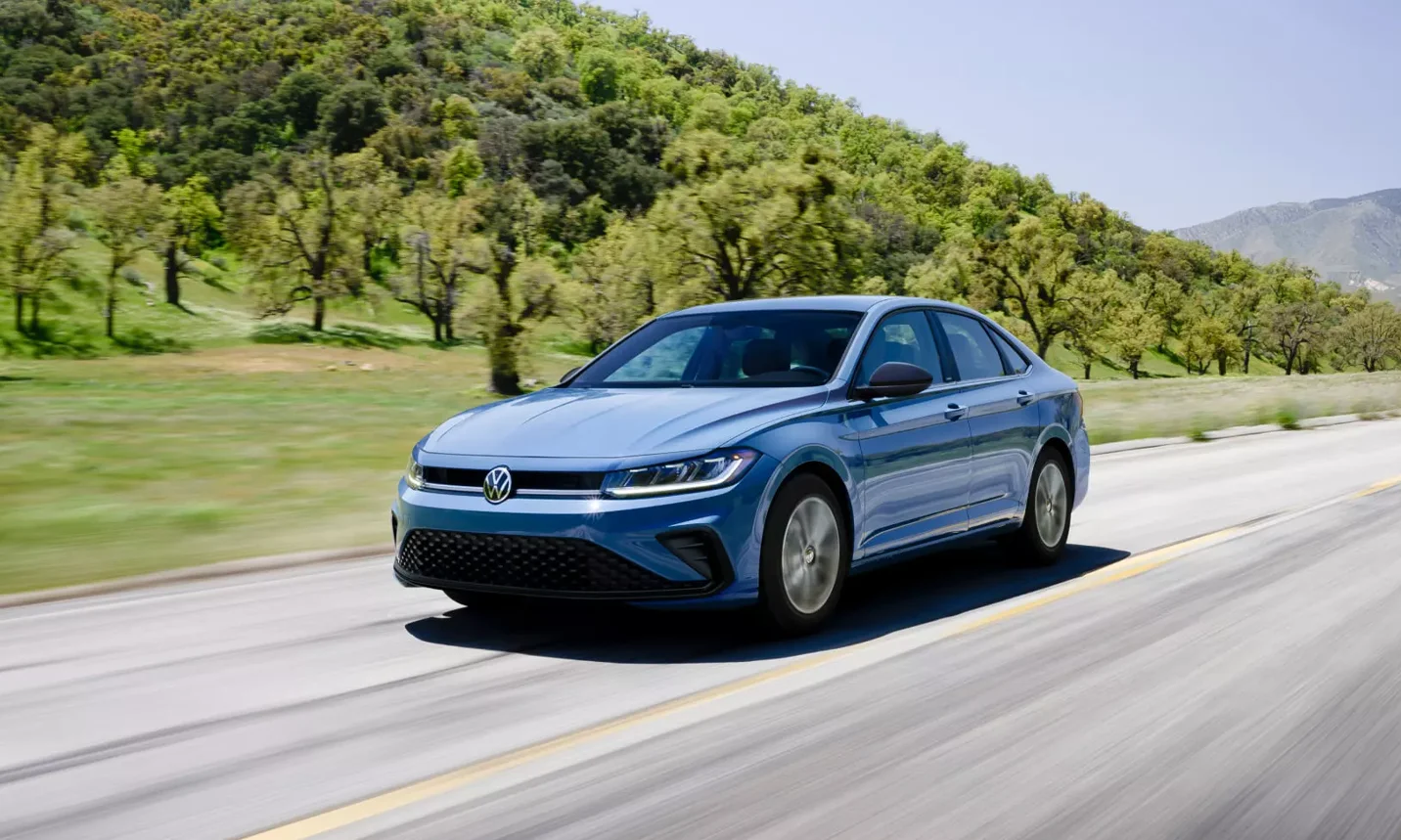 2025 Jetta driving down the road